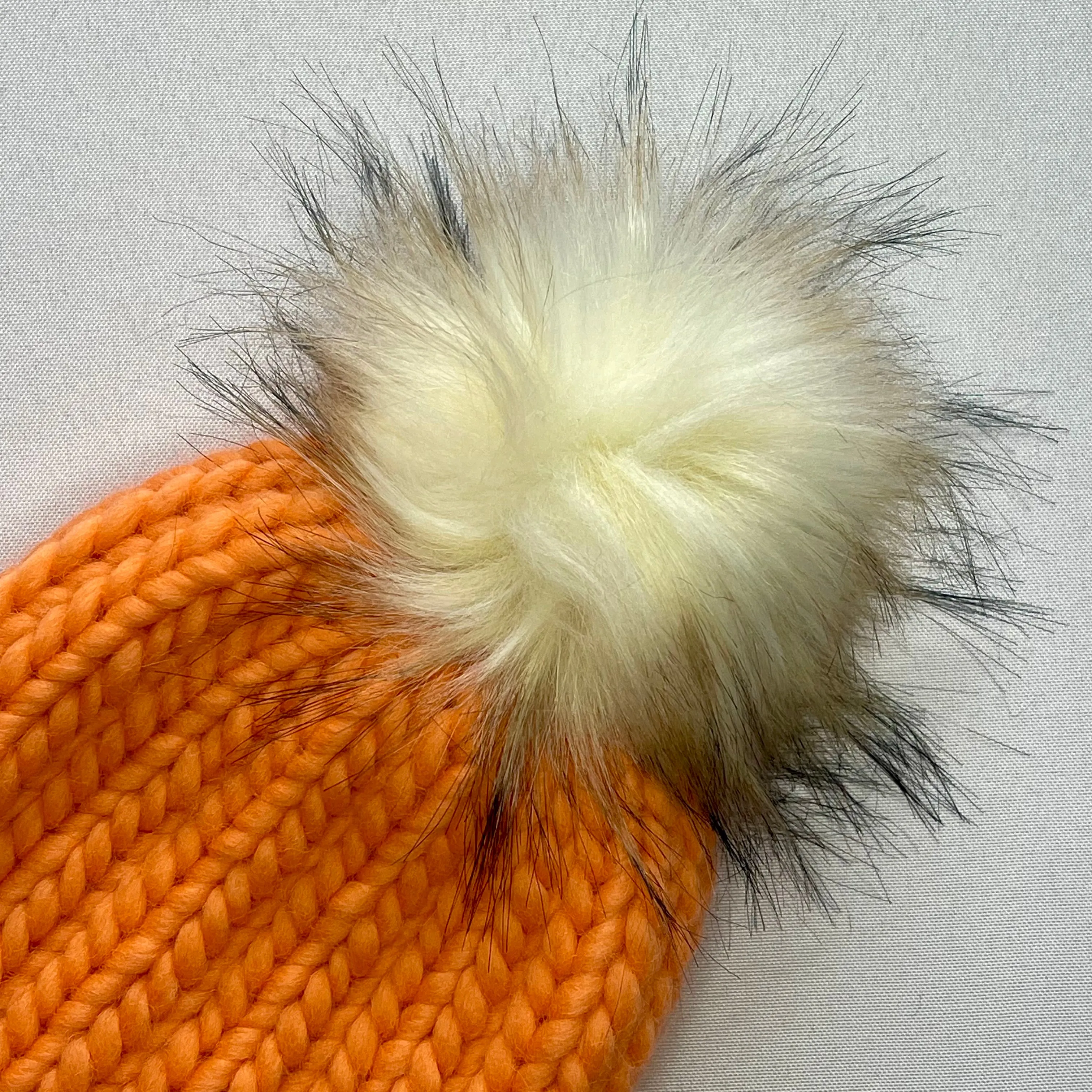 Peach Peruvian Wool Knit Hat with Faux Fur Pom Pom